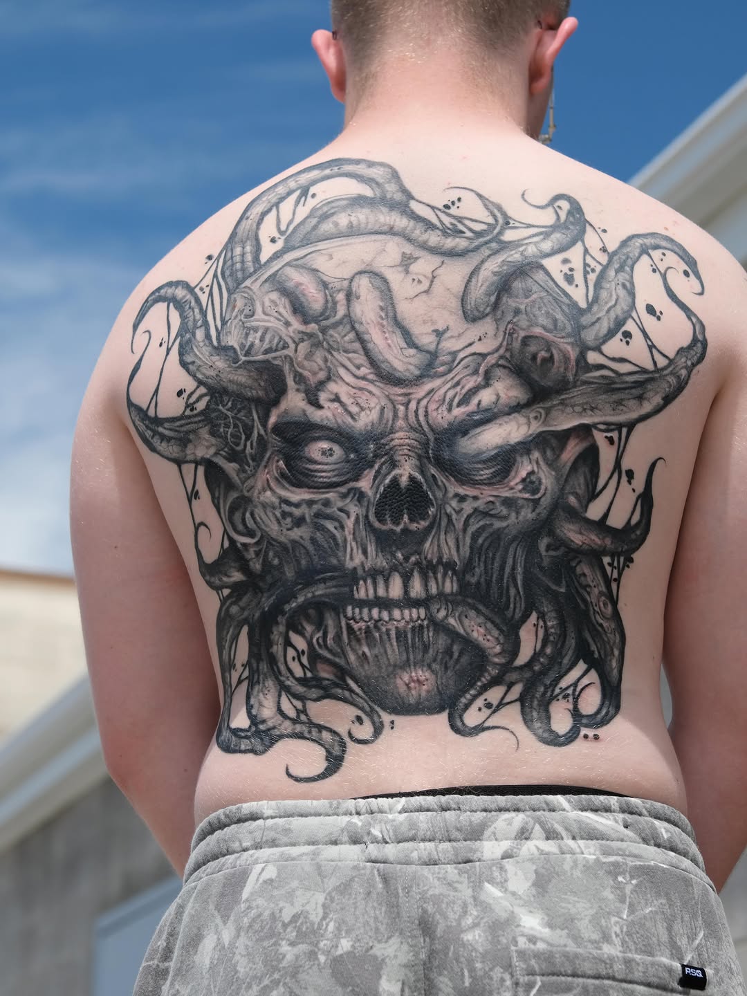 Tattoo by @wilfred_arts — dark_realism, black_and_grey