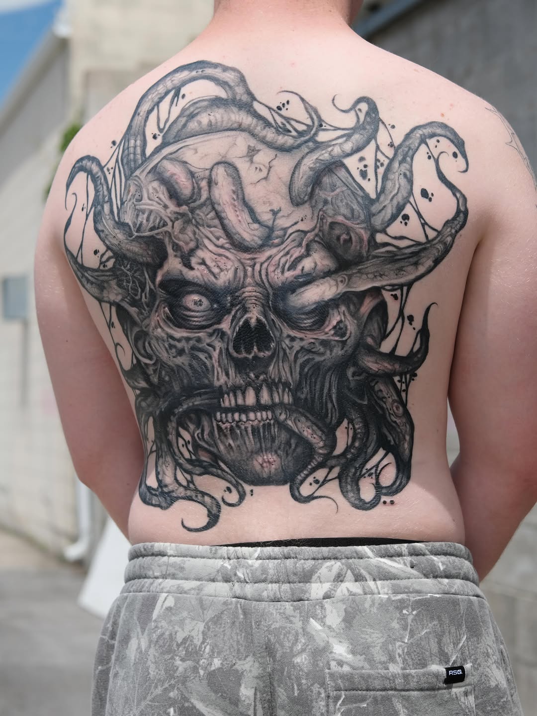 Tattoo by @wilfred_arts — dark_realism, black_and_grey