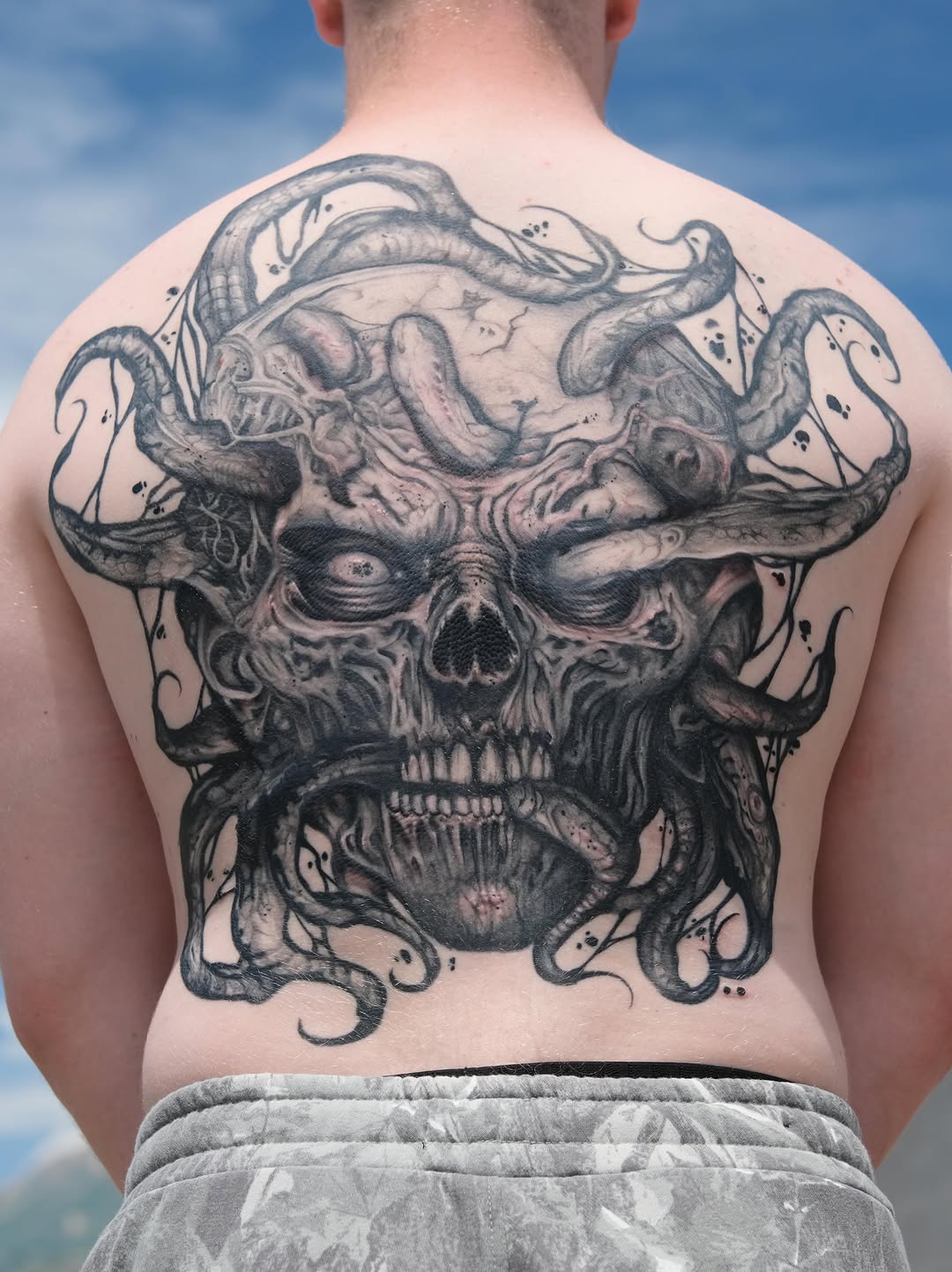 Tattoo by @wilfred_arts — dark_realism, black_and_grey