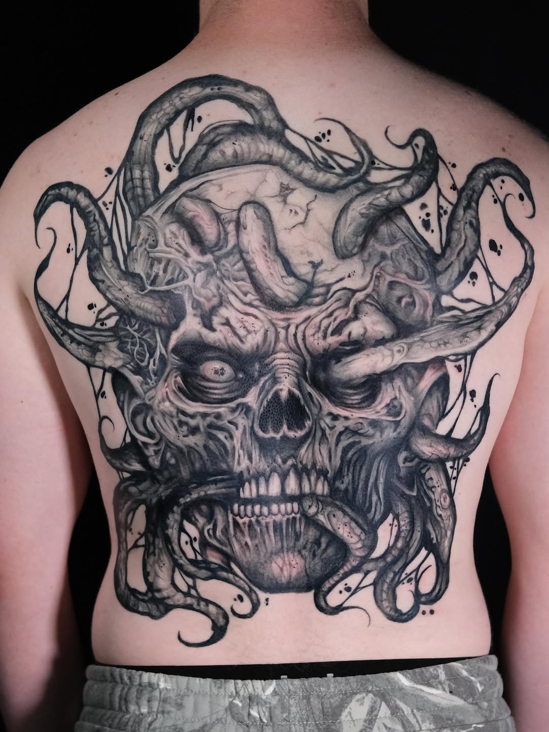 Tattoo by @wilfred_arts — dark_realism, black_and_grey