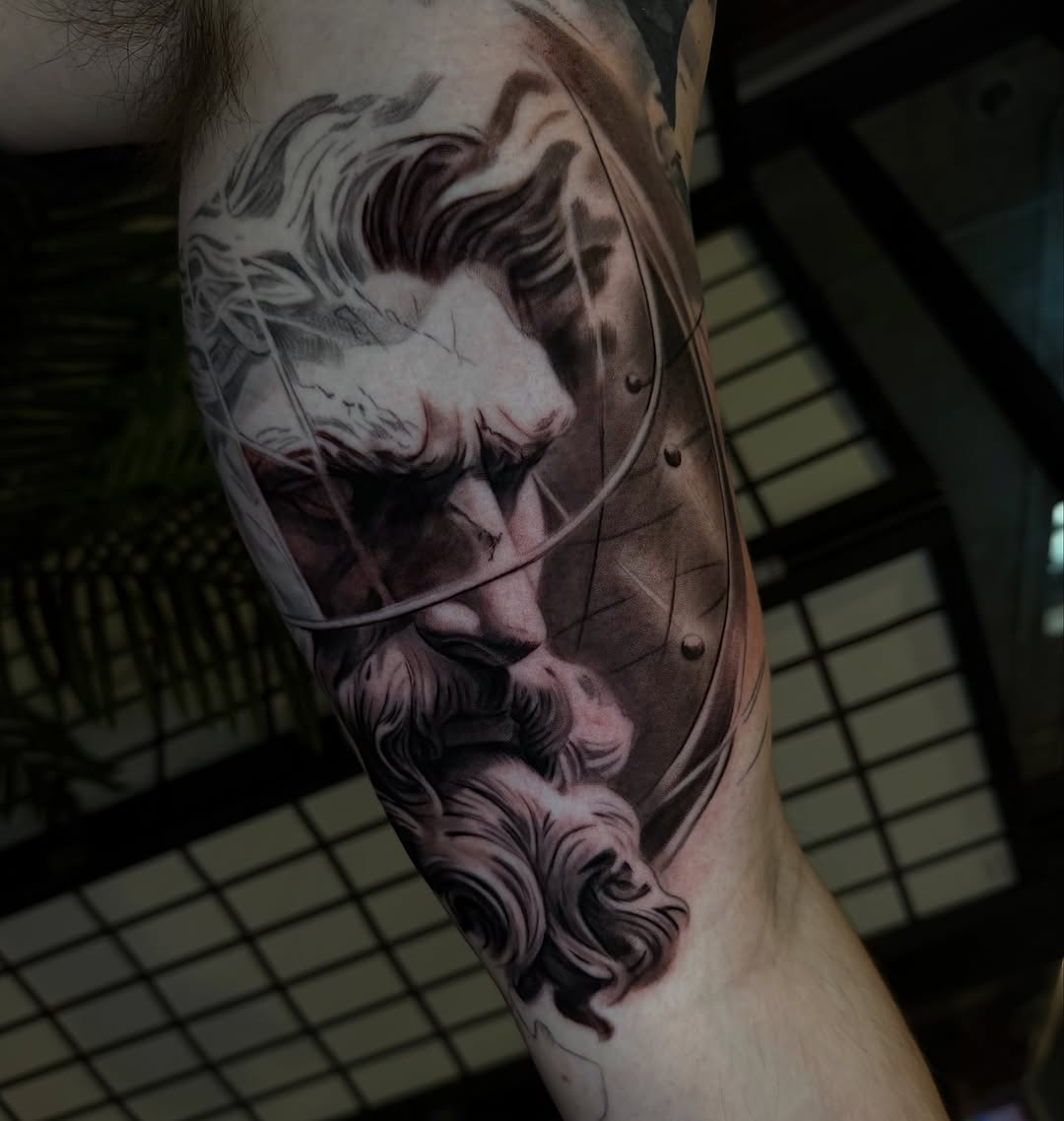 Tattoo by @carter.studios.ink โ realism, black_and_grey