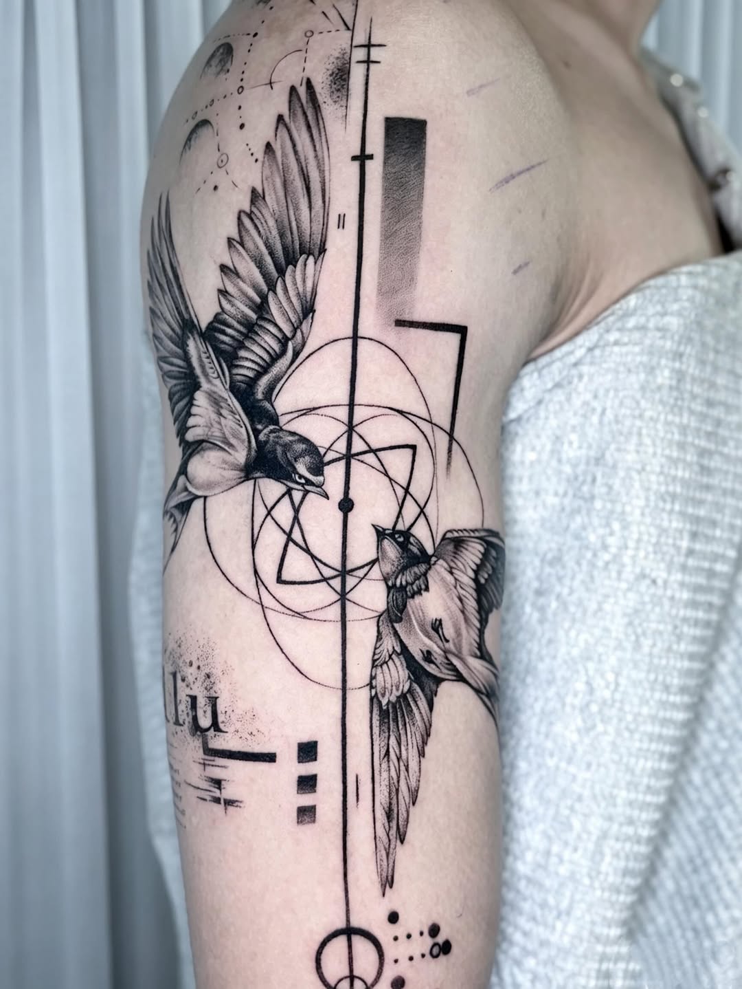Tattoo by @tizy.inks — black_and_grey, geometric