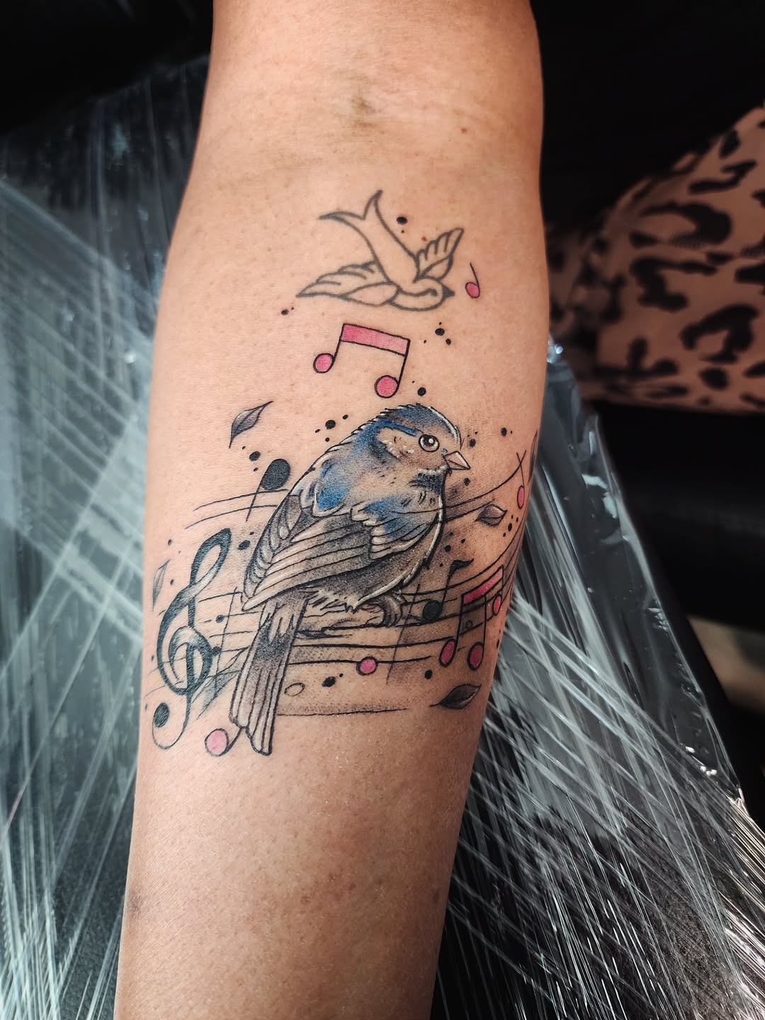 Tattoo by @consumer.inkslinger.artist — illustrative, black_and_grey
