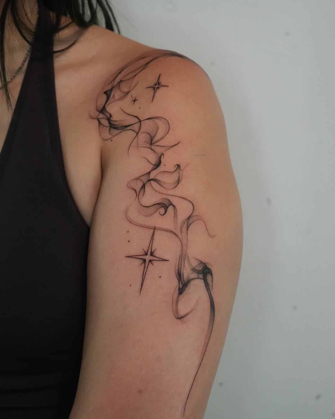 Tattoo by @tattooer_r.tee — fine_line, black_and_grey