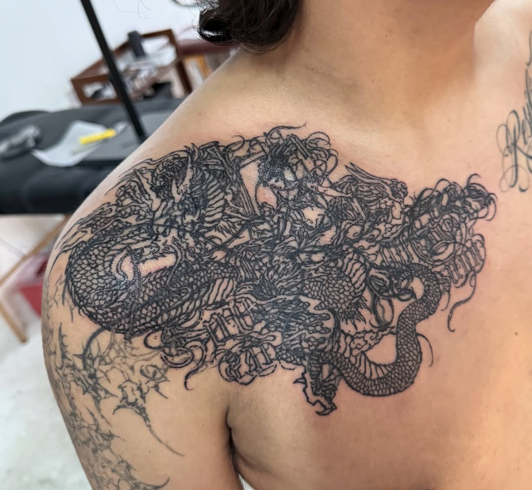 Tattoo by @miserymilkshake — blackwork, illustrative