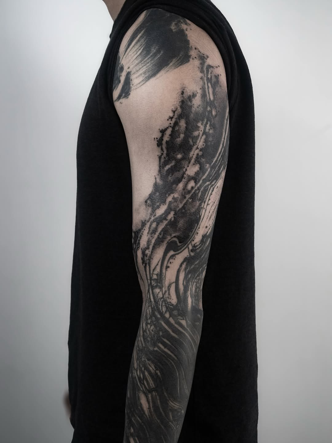 Tattoo by @9ti_________ — blackwork, abstract