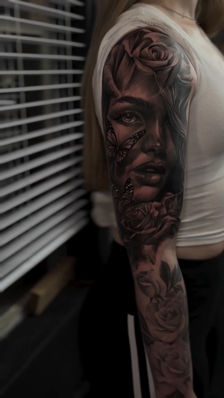 Tattoo by @tattoo_ravay — realism, black_and_grey