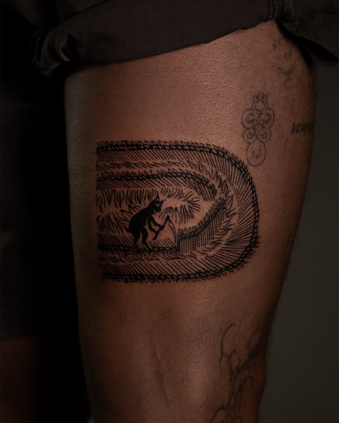 Tattoo by @brak.ttt — illustrative, blackwork