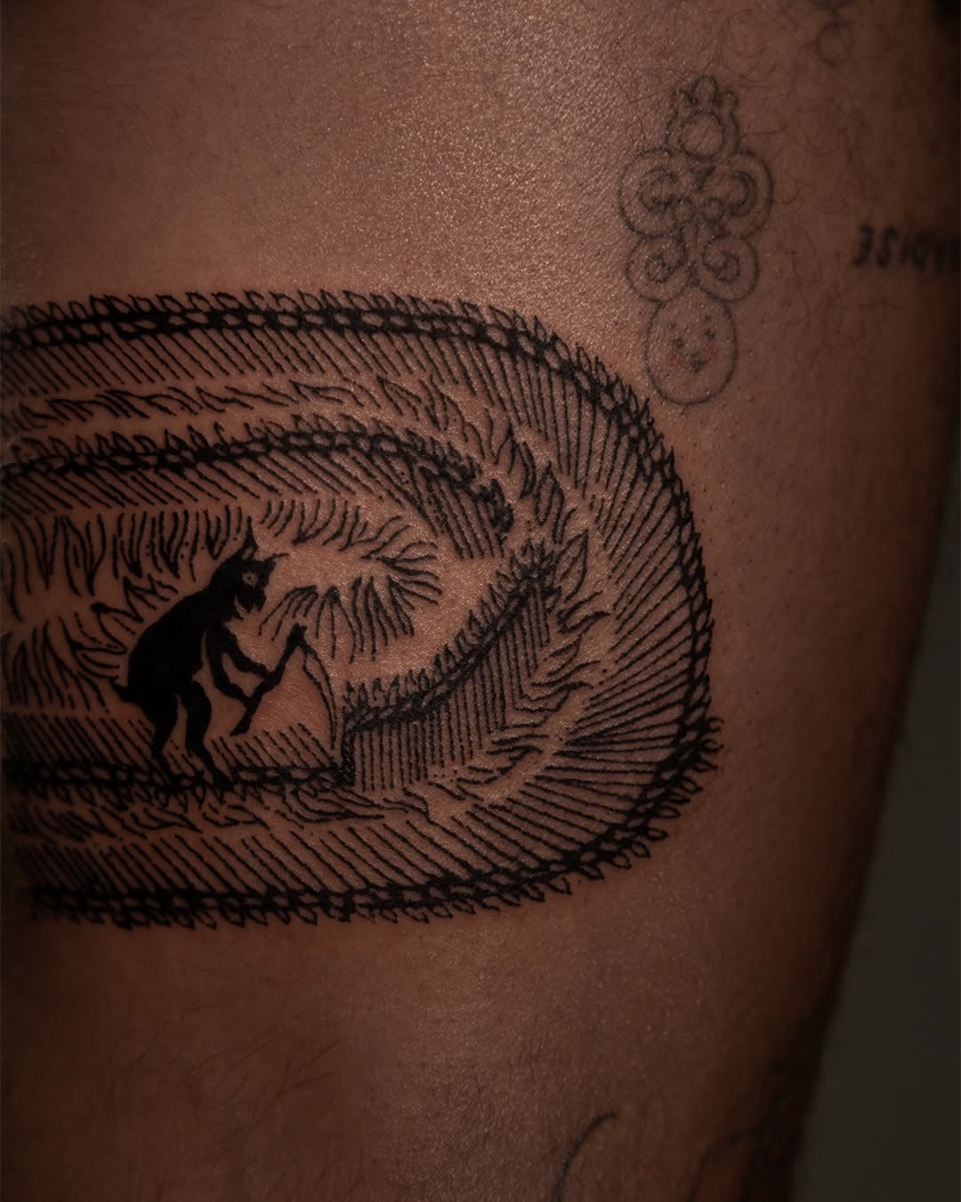 Tattoo by @brak.ttt — illustrative, blackwork