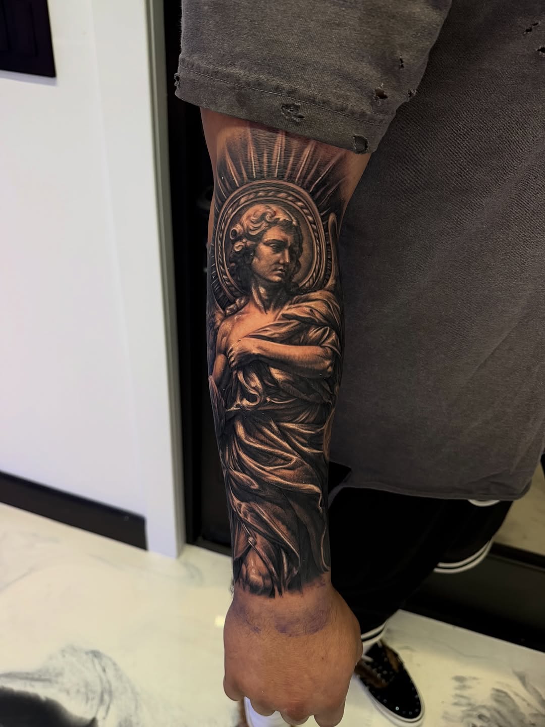 Tattoo by @la.wry โ realism, black_and_grey