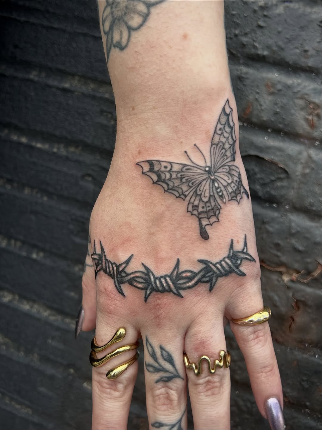 Tattoo by @bloodybriaa — illustrative, blackwork