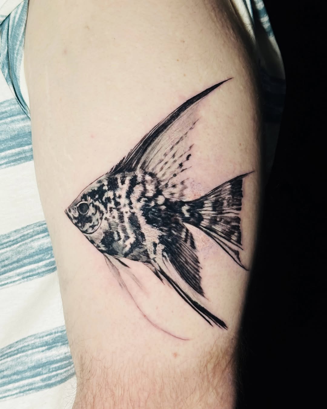 Tattoo by @nonoka_tattoo — realism, black_and_grey