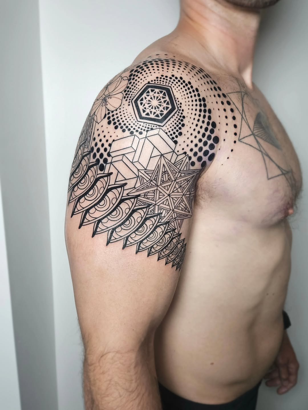 Tattoo by @tattsbytayy — geometric, dotwork