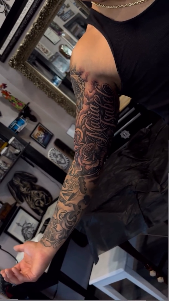 Tattoo by @mikeandinkk — black_and_grey, illustrative