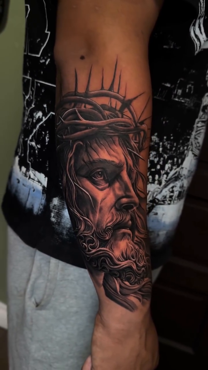 Tattoo by @tats.by.morb โ realism, black_and_grey