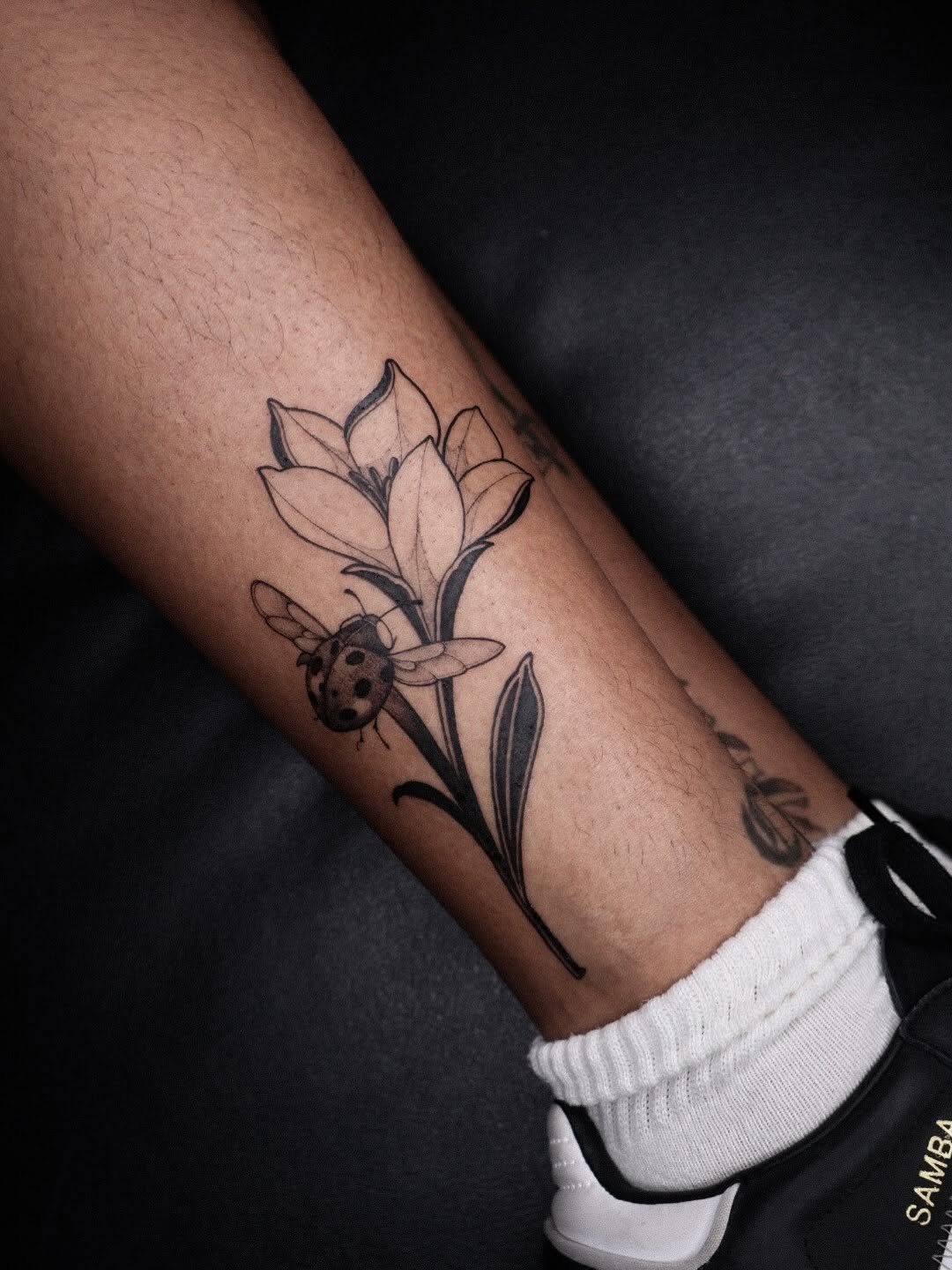 Tattoo by @samishii.ttt — fine_line, black_and_grey
