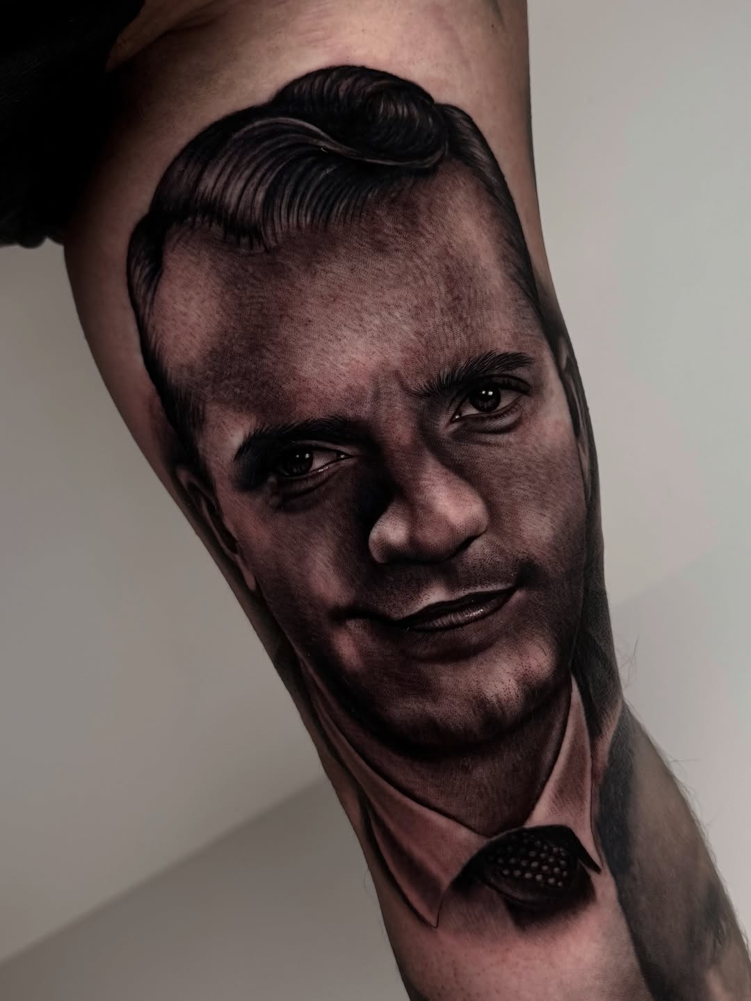 Tattoo by @fernxndojrtatts — realism, black_and_grey