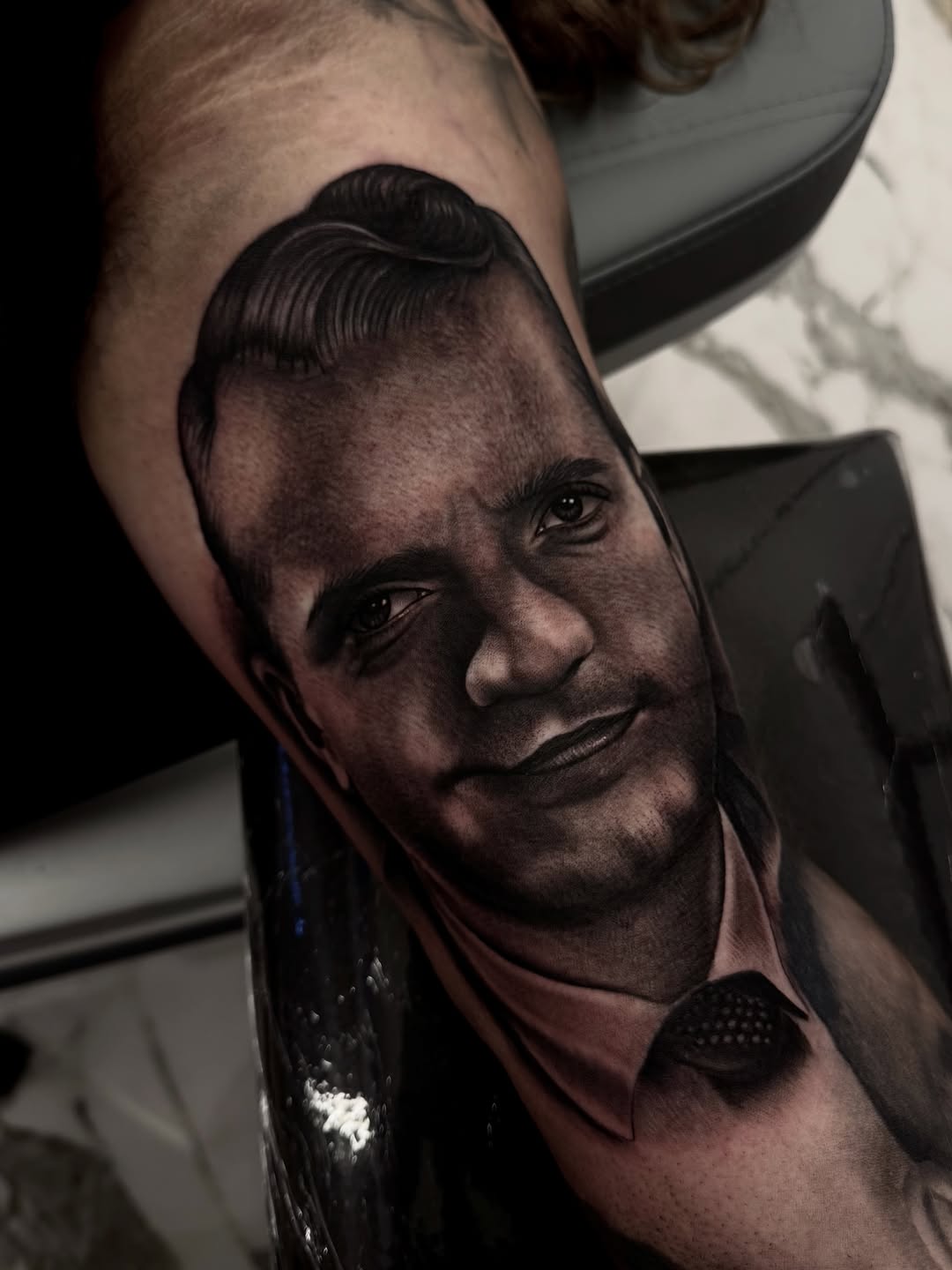 Tattoo by @fernxndojrtatts — realism, black_and_grey