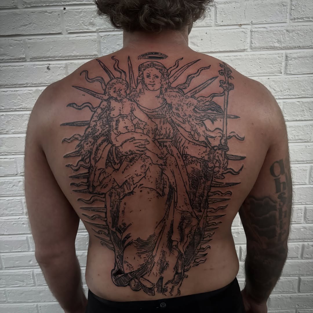 Tattoo by @unknownliquids — illustrative, blackwork