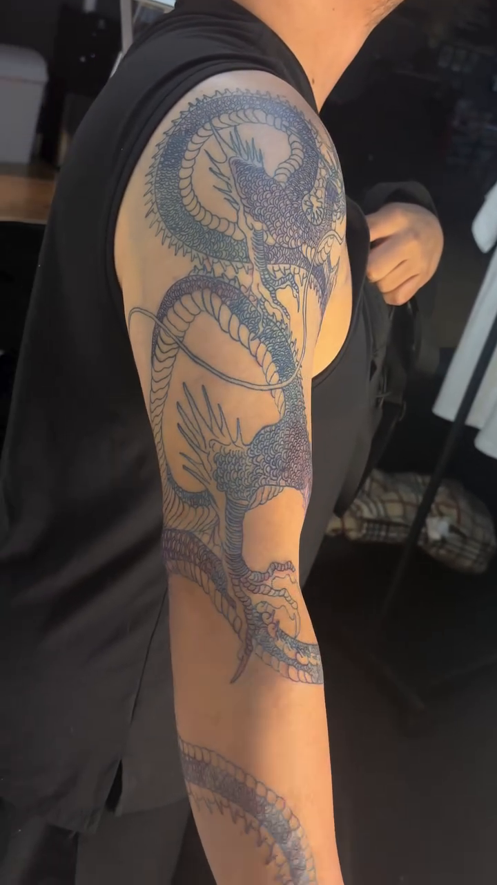 Tattoo by @vo.ink.metric โ japanese_irezumi, black_and_grey