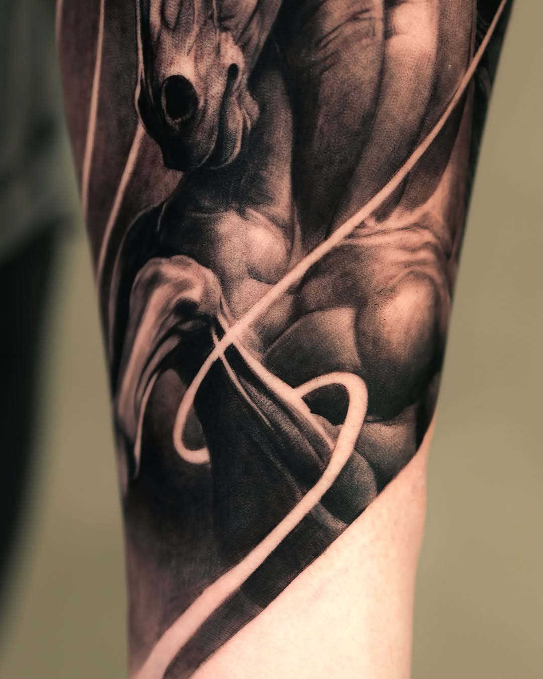 Tattoo by @tattooist_reset — realism, black_and_grey