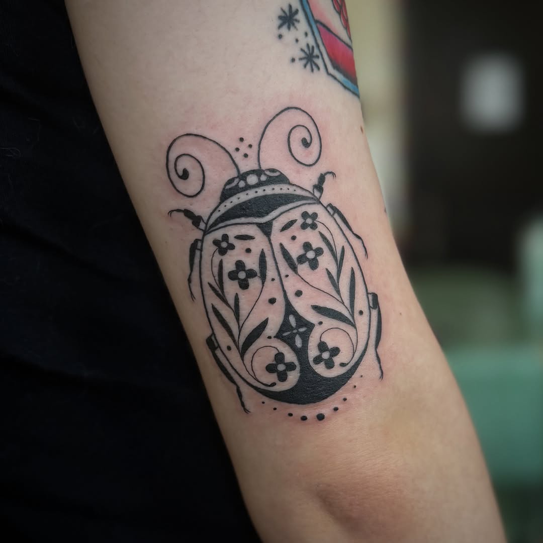Tattoo by @leahearltattoo — blackwork