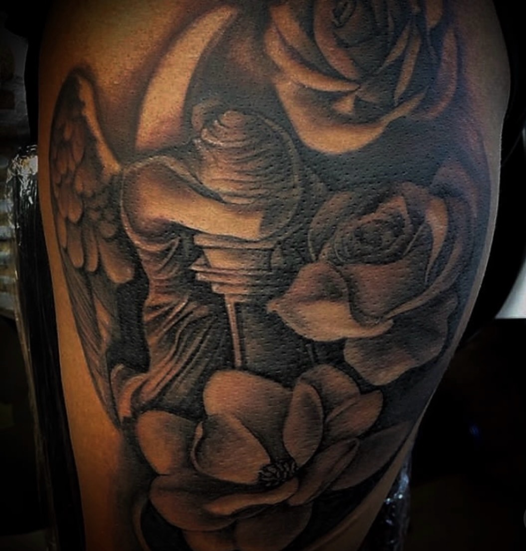 Tattoo by @explicitartdevin — black_and_grey, realism