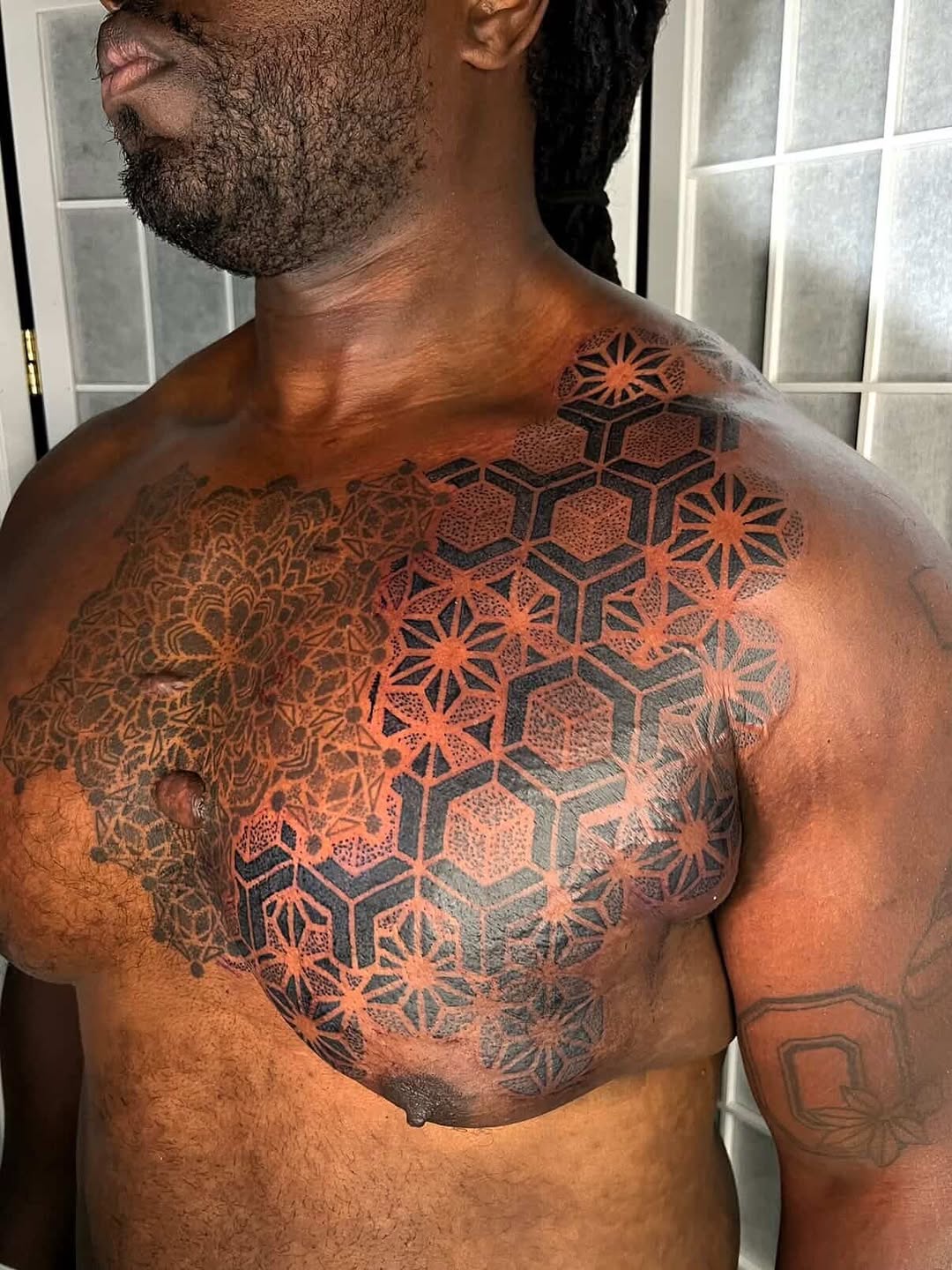 Tattoo by @thebig_rosstattoo — geometric, dotwork