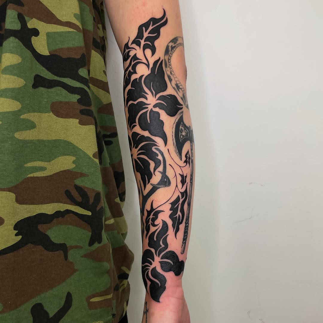 Tattoo by @iris.tats — blackwork, illustrative