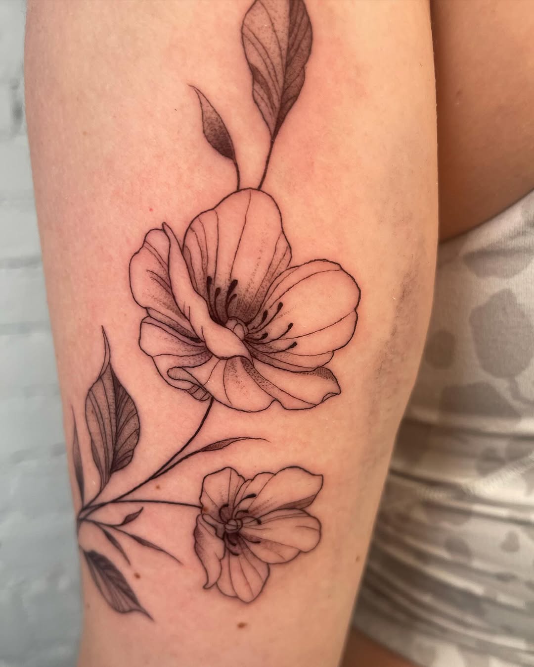 Tattoo by @authentics_nyc — fine_line, black_and_grey