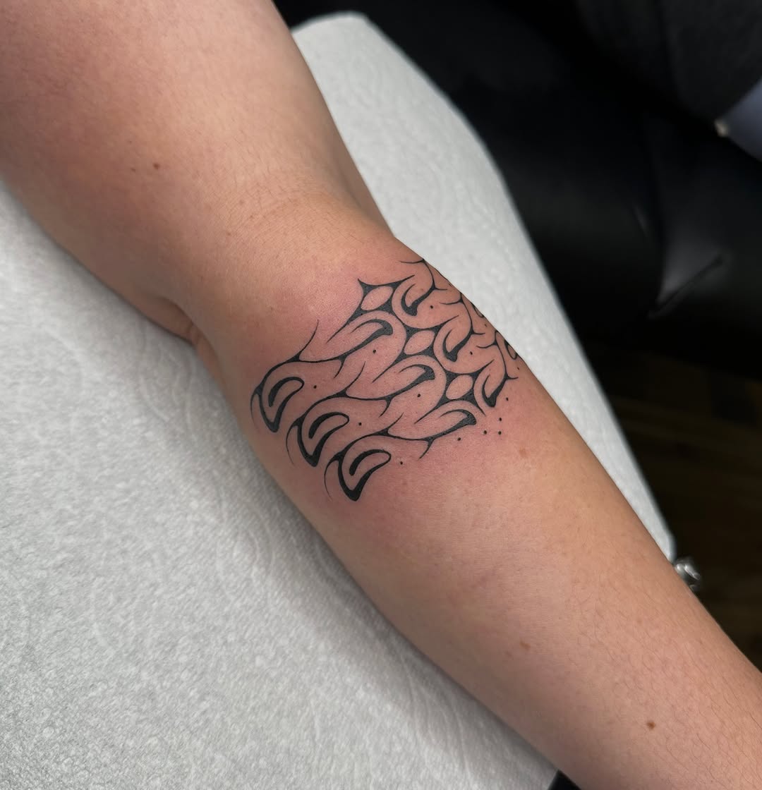 Tattoo by @fatalkatietattoo — blackwork, ornamental