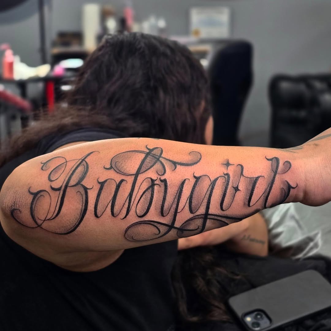 Tattoo by @fatboy562ink — lettering_script, black_and_grey