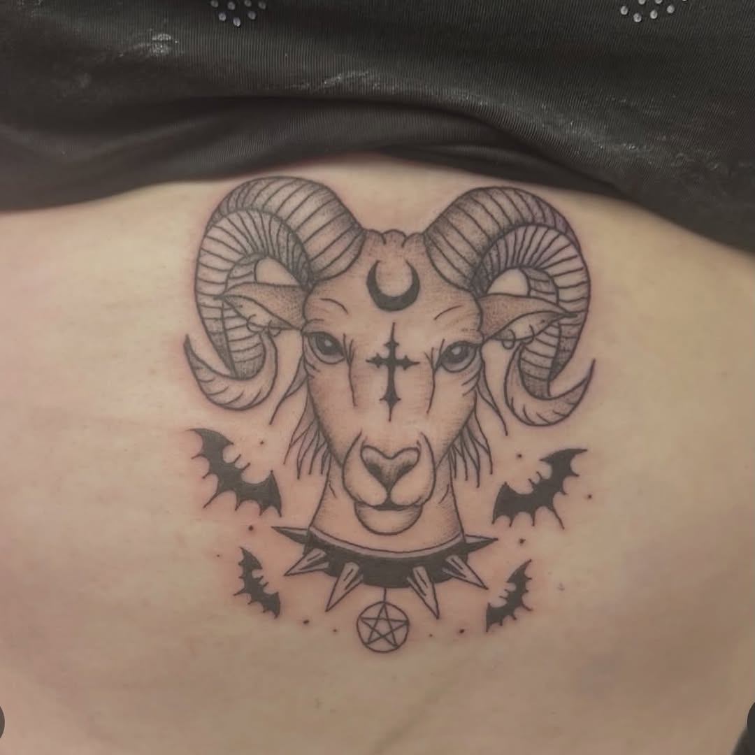 Tattoo by @meg.the.cyclopz_ — black_and_grey, dark_realism