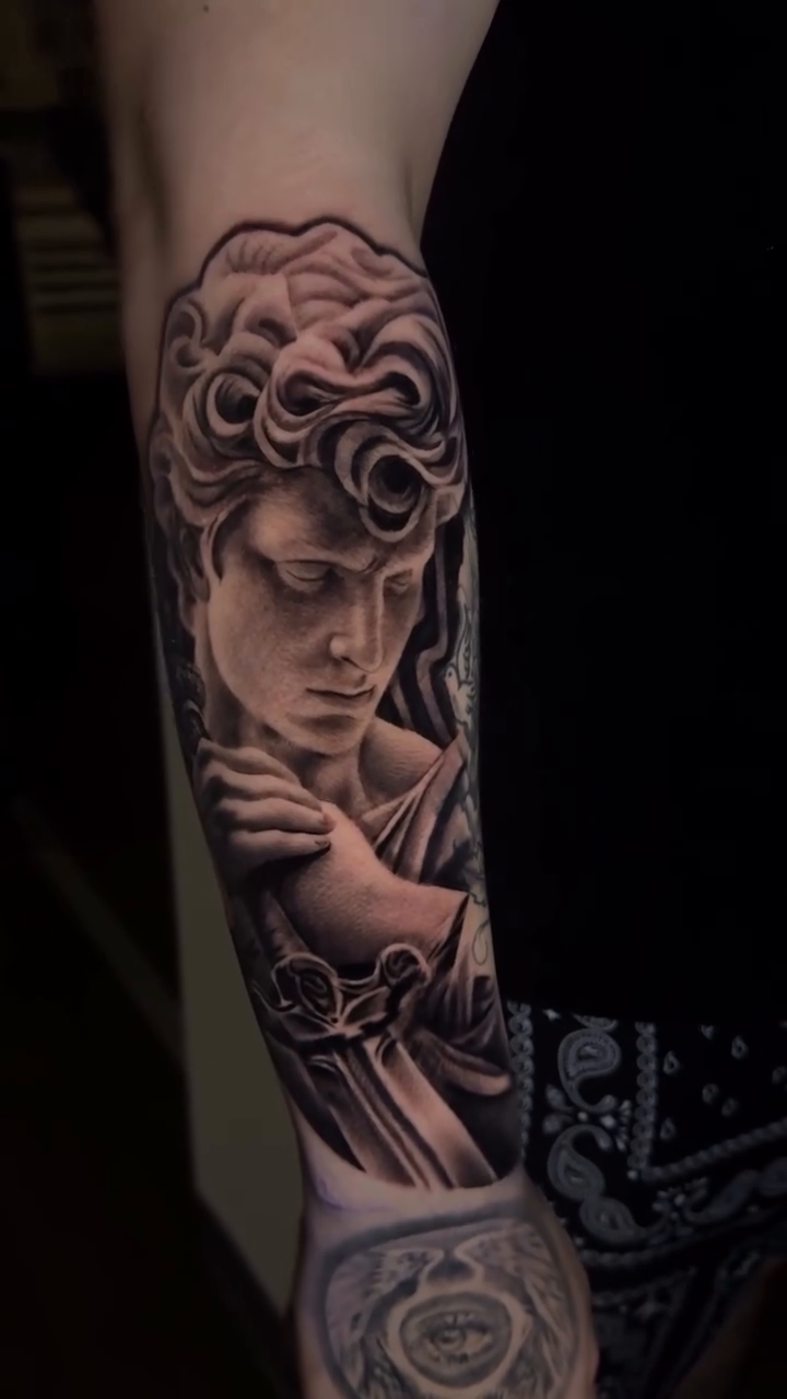 Tattoo by @toniotatts — realism, black_and_grey