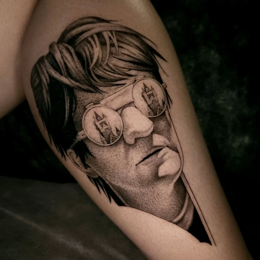 Tattoo by @swirly.boi — realism, black_and_grey