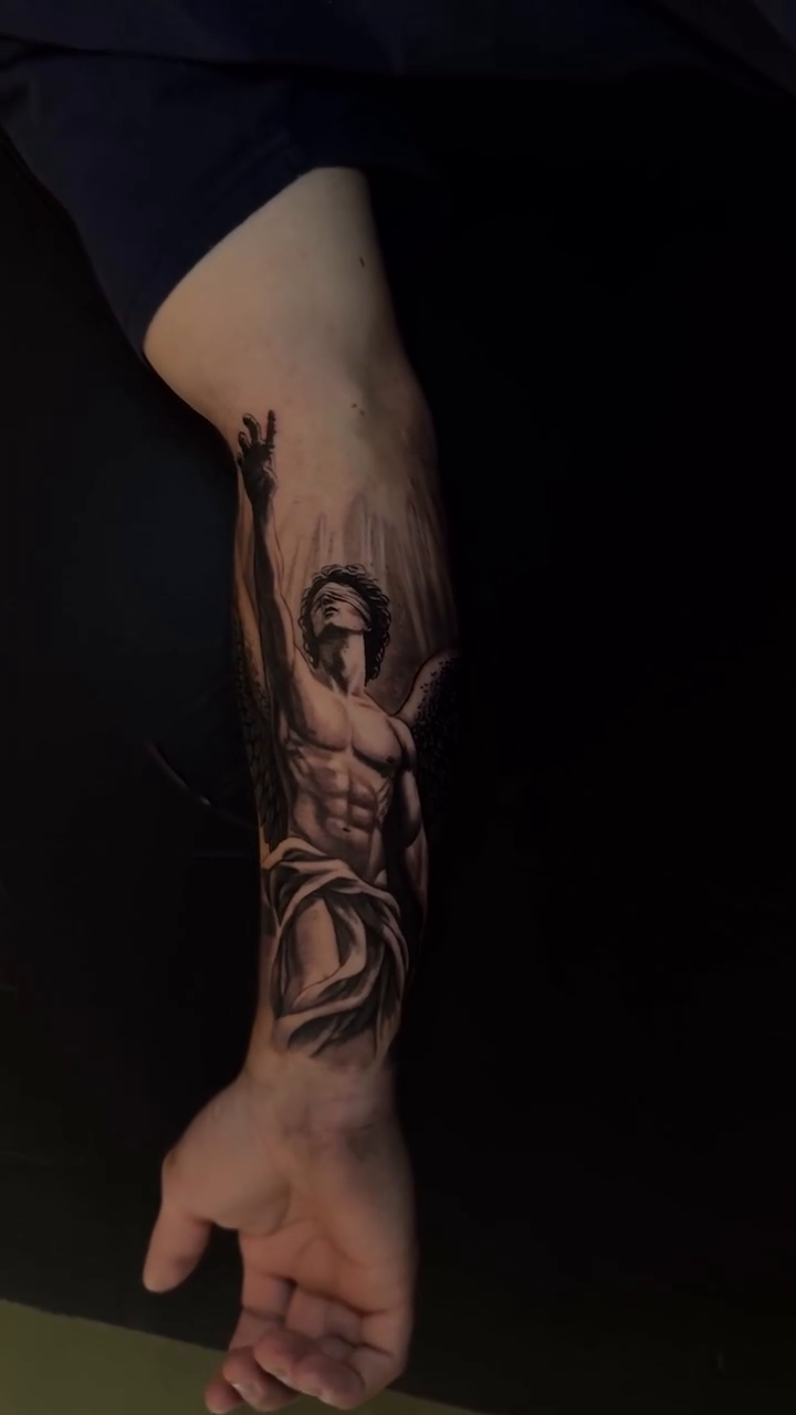 Tattoo by @elian.tattoos — realism, black_and_grey