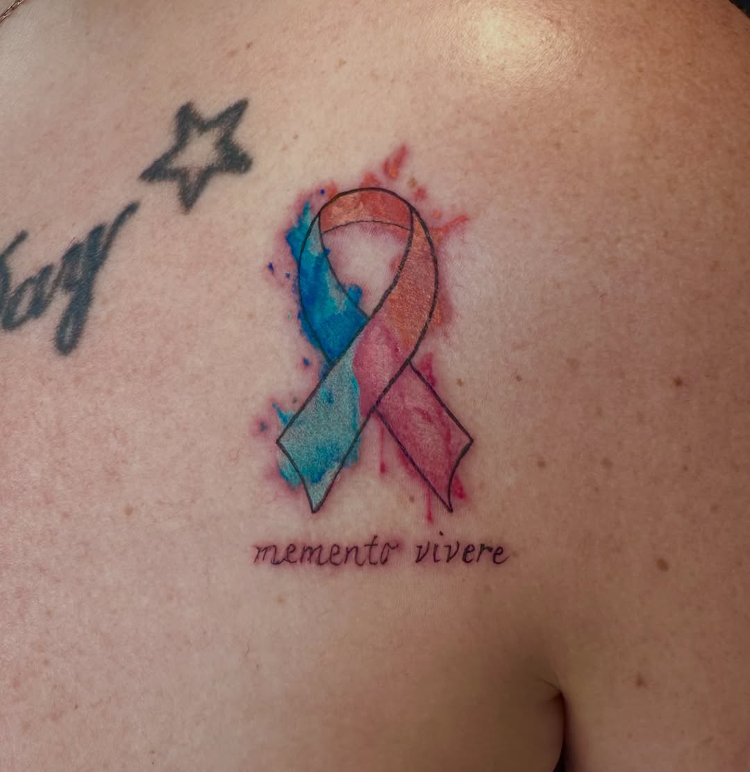 Tattoo by @samanthakellytattoos — watercolor, lettering_script