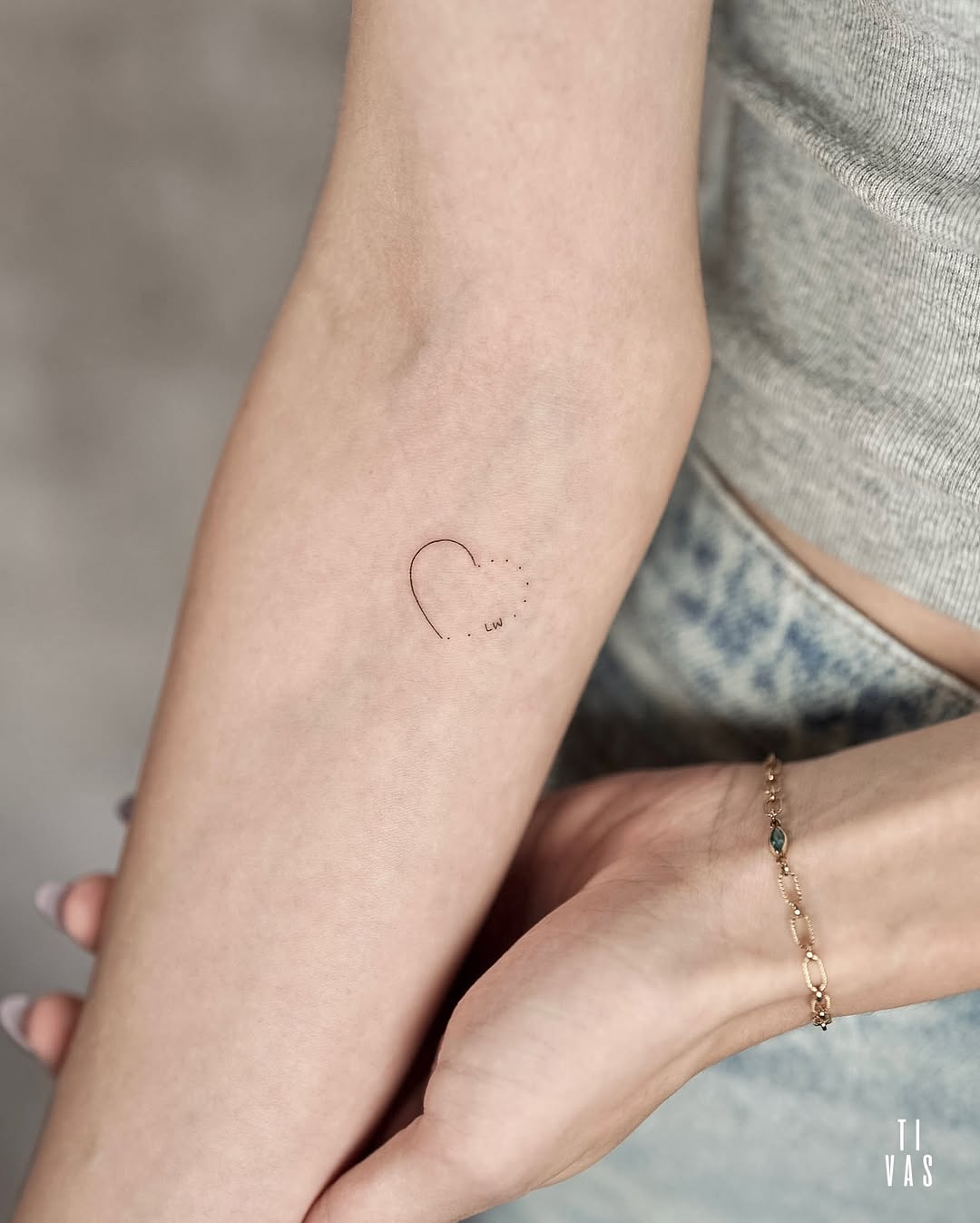 Tattoo by @tivas — fine_line, minimalist