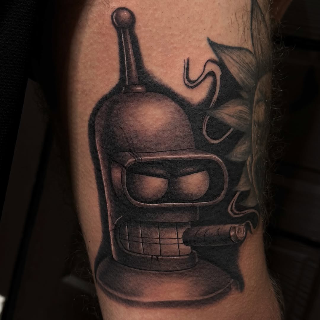 Tattoo by @tats.by.morb โ realism, black_and_grey
