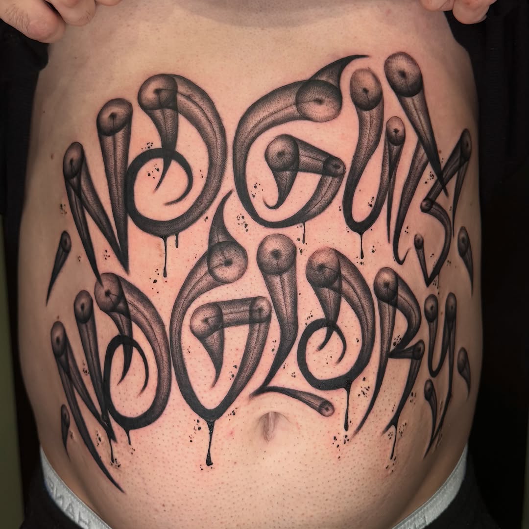 Tattoo by @tats.by.morb โ lettering_script, blackwork