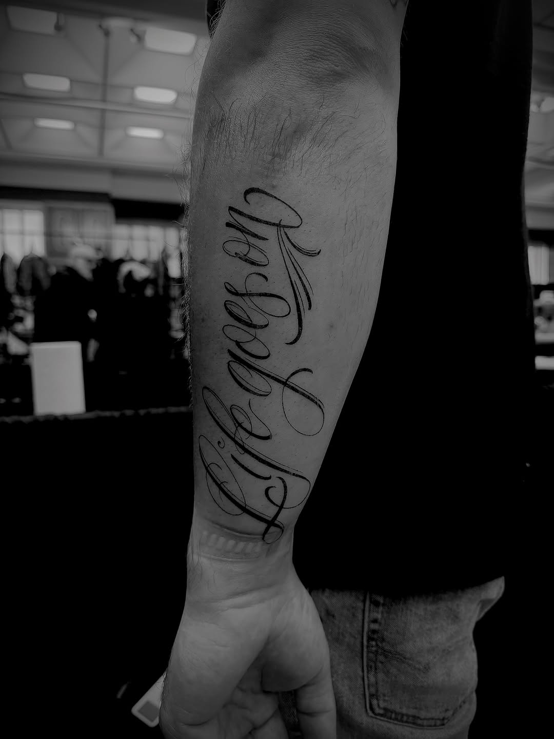 Tattoo by @storylines.tattoos — lettering_script, fine_line