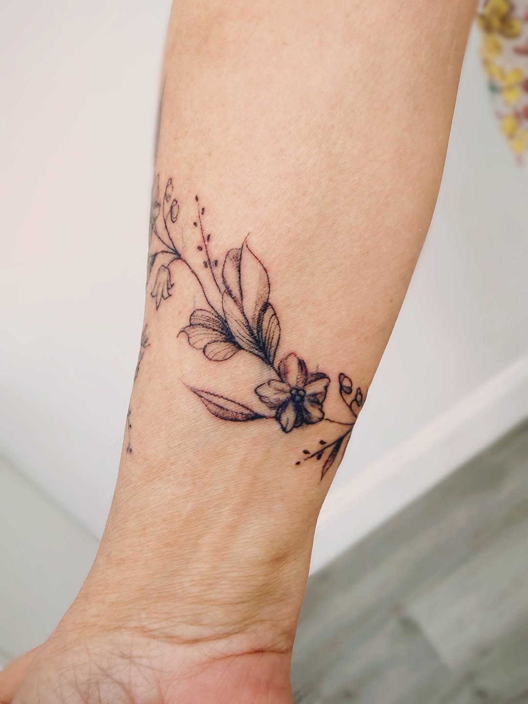 Tattoo by @real_street_tattoos — fine_line, black_and_grey
