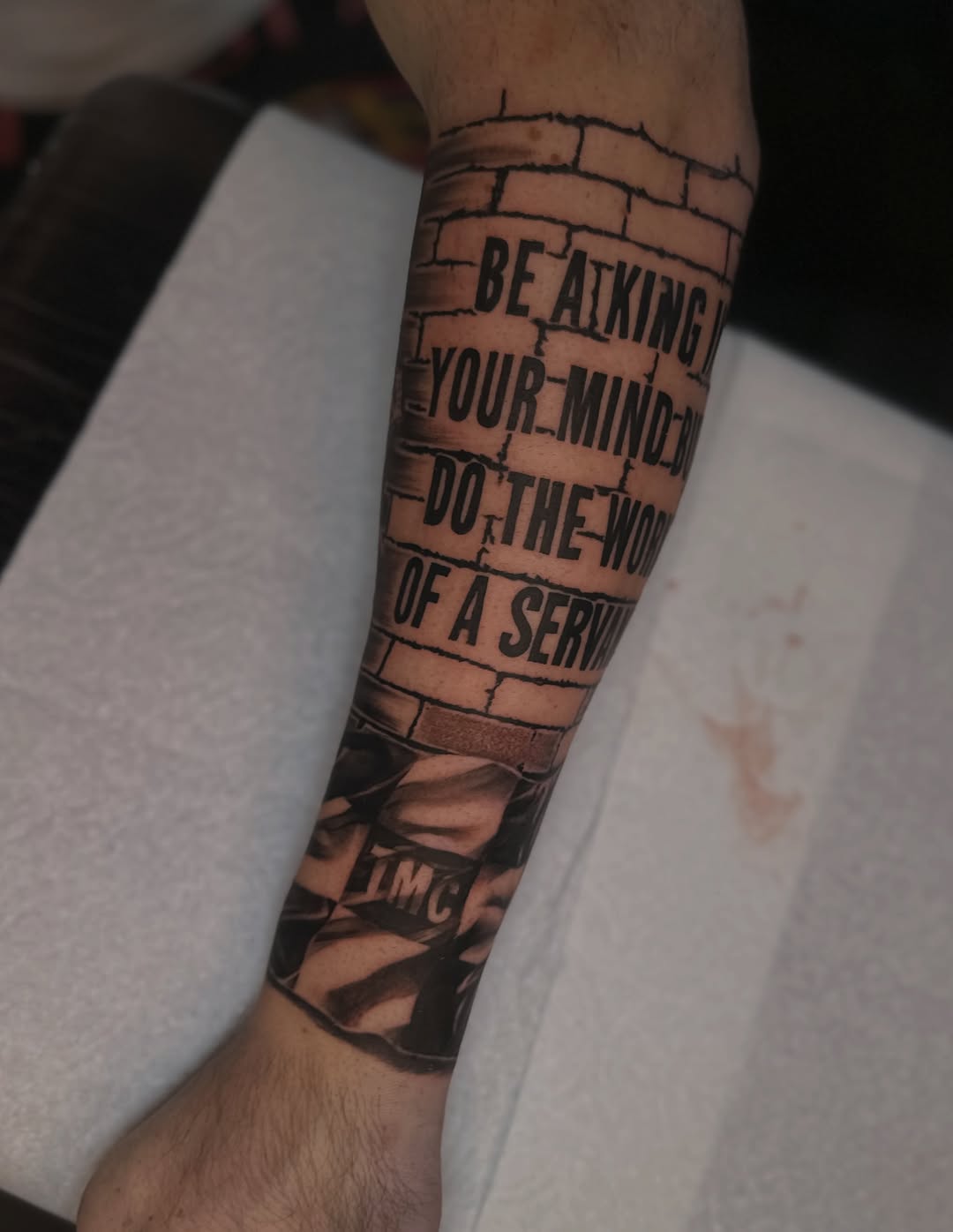Tattoo by @inkmando — lettering_script, blackwork