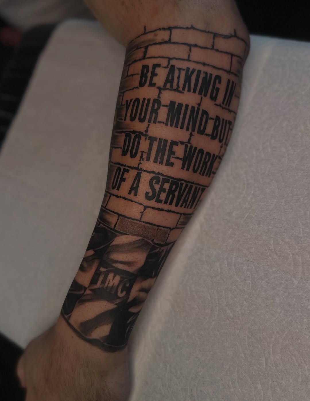 Tattoo by @inkmando — lettering_script, blackwork