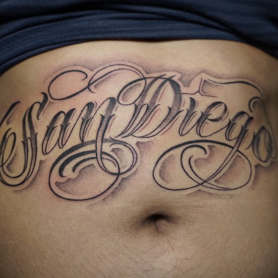 Tattoo by @adrian__tattoos — lettering_script, chicano