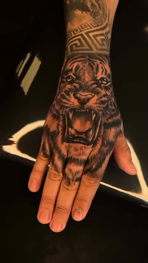Tattoo by @marcos_tattoos — realism, black_and_grey