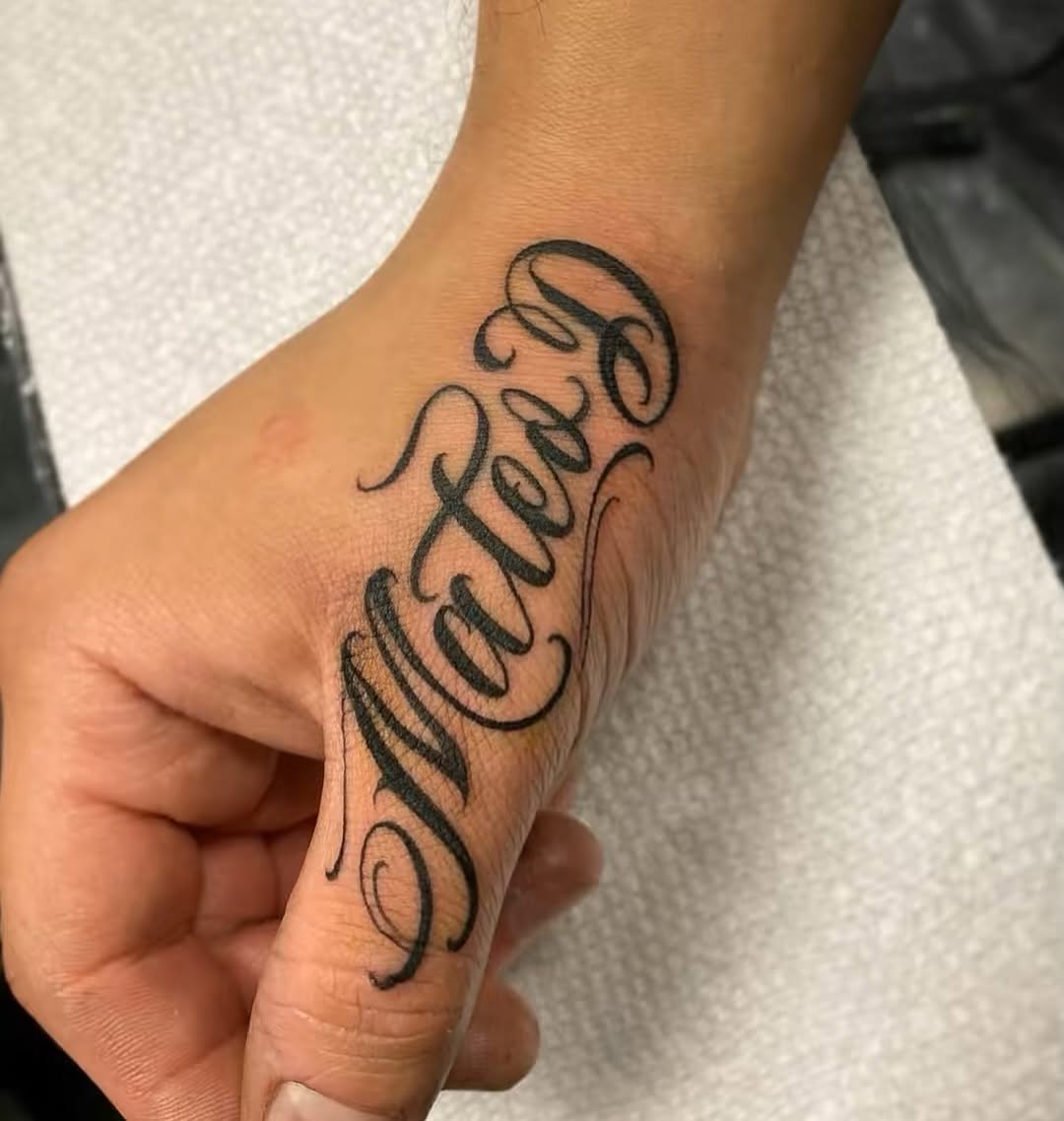 Tattoo by @lexmiranda — lettering_script, chicano