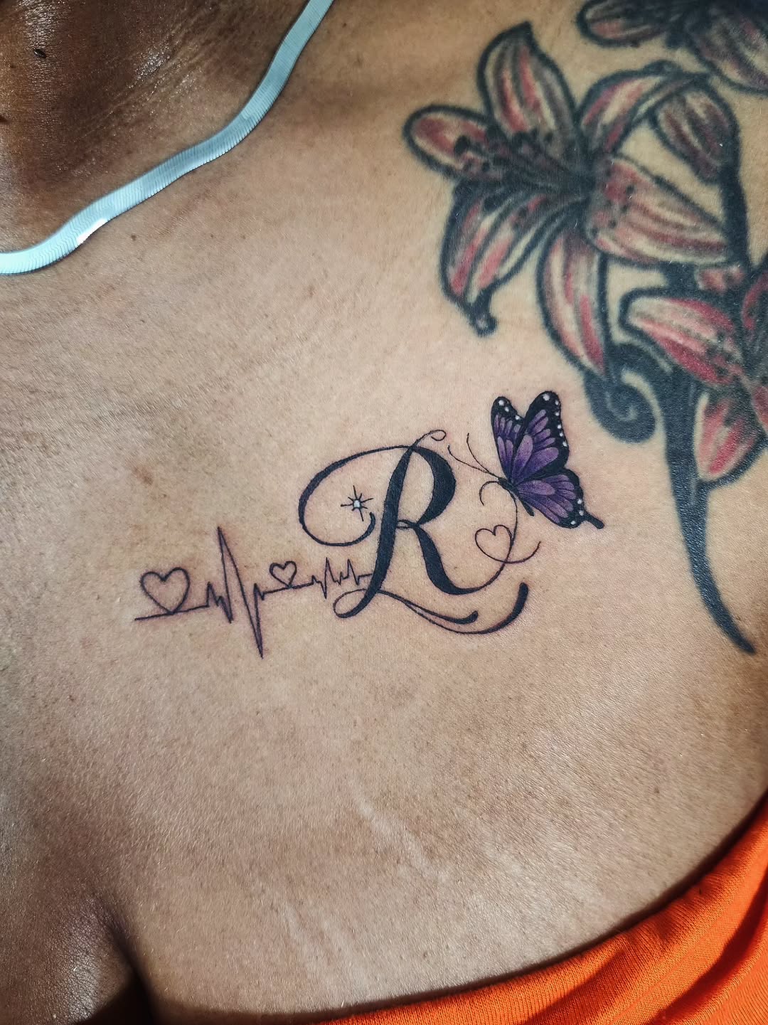 Tattoo by @consumer.inkslinger.artist — lettering_script, illustrative
