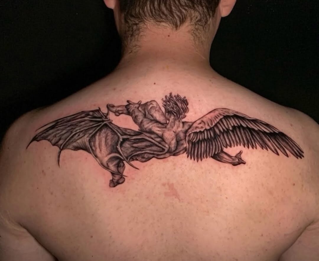 Tattoo by @elijahsdtattoos — realism, black_and_grey