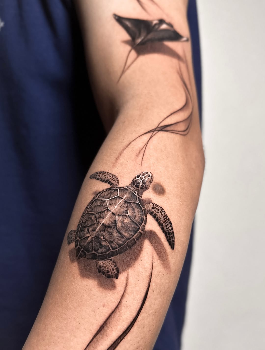 Tattoo by @_via_saru — realism, black_and_grey